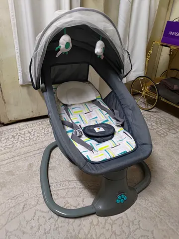 Gently Used Baby Rocker/Bassinet with Canopy and Toys
