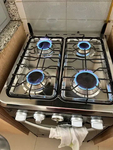 4-Burner Stainless Steel Gas - Good Working Condition. Last price