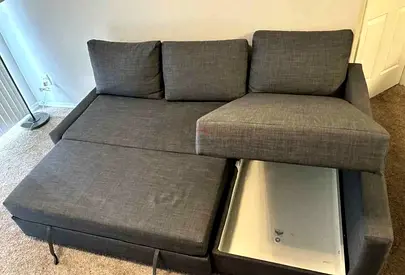 Grey L-shaped Sofa Bed with Storage - Good Condition