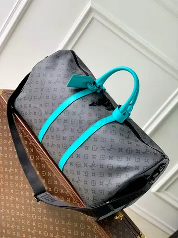 Louis vuitton Bandoullere travel duffle bag