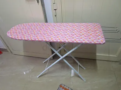 Sturdy Ironing Board with Floral Cover - Good Condition
