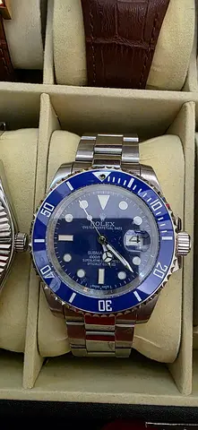 Submariner style men's stainless steel watch with blue dial and bezel