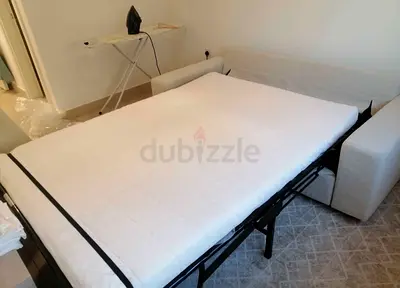 Comfortable Pull-Out Sofa Bed in beige  Fabric
