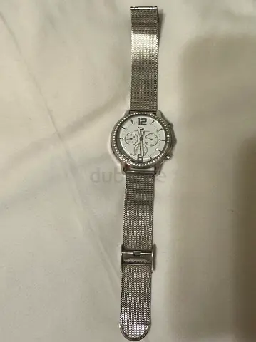 Tommy Hilfiger Silver mesh strap women's wristwatch with crystal bezel.