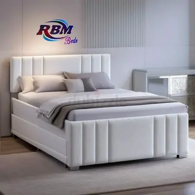 White Upholstered Double Bed with Headboard and Storage Base