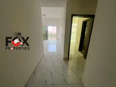 Live in an exceptional two-bedroom apartment in Ajman, first occupancy, special price, open view, in a vibrant location close to all services, ready t