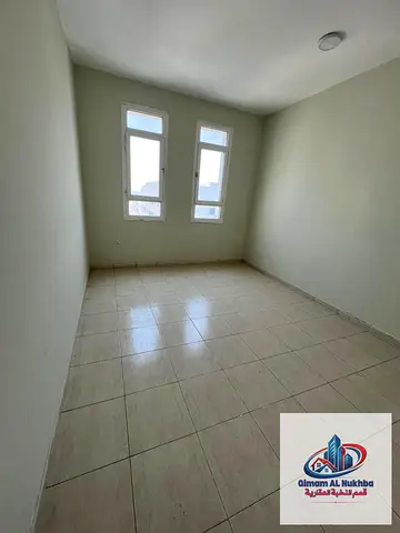 Affordable 1BR in Al Majra, 2 Baths, Central AC & Gas, Windows with Views, Near Sharjah Corniche, Prime Location with Easy Ajman & Dubai Access.