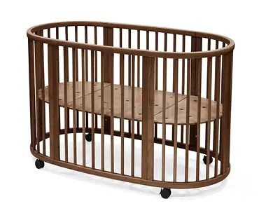 Stokke wooden baby crib / bassinet on wheels - dark brown.