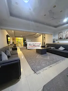 Villa for sale in Al-Khuzamiyah, featuring two external annexes.