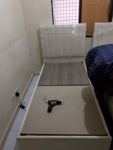 Single white storage bed frame with padded headboard - good condition