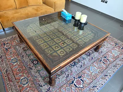Available high quality wood coffee table like a new