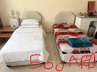 Two single beds with headboards - good condition