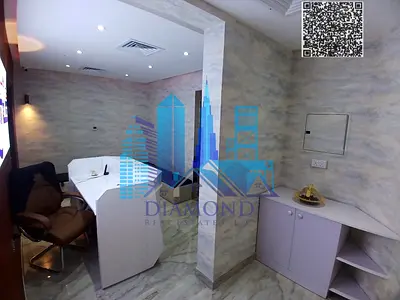 Office for annual rent—partitioned and renovated with interior décor—located in Horizon Towers (Tower D), Ajman.