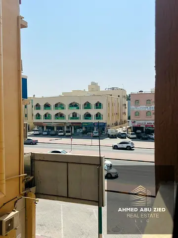 1BR hall for rent in Al Rawda 3 on Sheikh Ammar Street near Every Day Mall; balcony, split A/C, 1 bathroom; yearly rent AED 27,000, 4 payments, undate