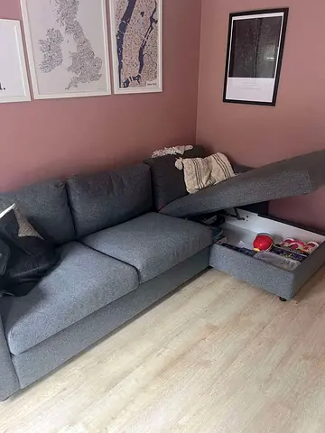 Grey L-shaped storage sofa bed— good condition, one side storage
