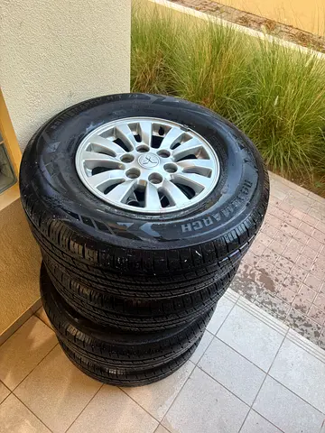 Mitsubishi Pajero Genuine OEM Alloy Rims & Tires 265/70R16 – Set of 4