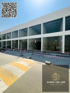 Commercial shop for rent on Khalifa Road in Al Rawda 2, steps from Sheikh Ammar Street and Ajman wor