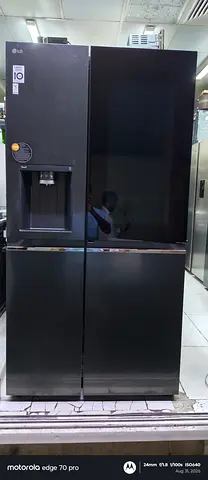 LG Insta view black side-by-side refrigerator with water dispenser