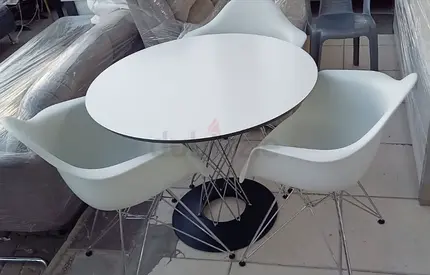White Round Dining Table with 3 Modern Shell Chairs - Set for sell free delivery in Abu Dhabi