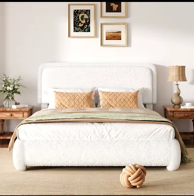 White upholstered double bed frame with curved headboard
