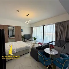 A golden opportunity! Luxurious, fully furnished studio with a balcony for monthly rent in Ajman's m