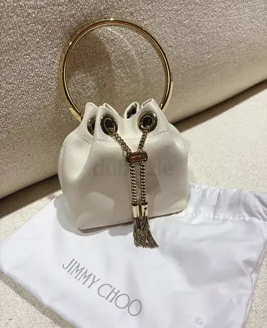 Brand new Jimmy Choo white and gold bon bon