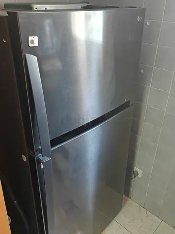 Stainless Steel LG Top Freezer Refrigerator - Good Working Condition