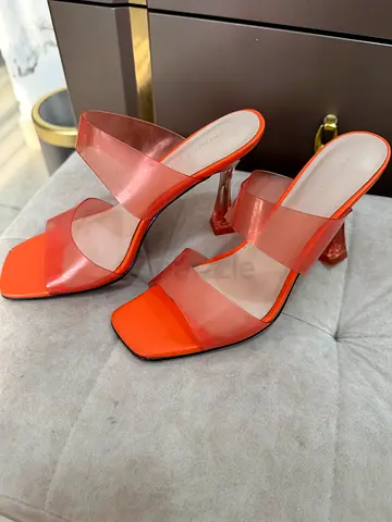 Genuine Charles and Keith Orange Transparent Strap Heels- original price 370 aed