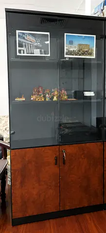 1no - wooden cupboard - Black Glass Display Cabinet with Wooden Base and Locks - Good Condition