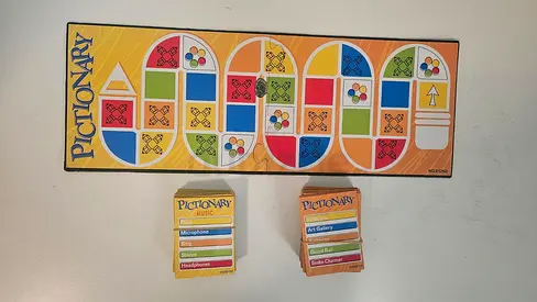 Pictionary board game with cards