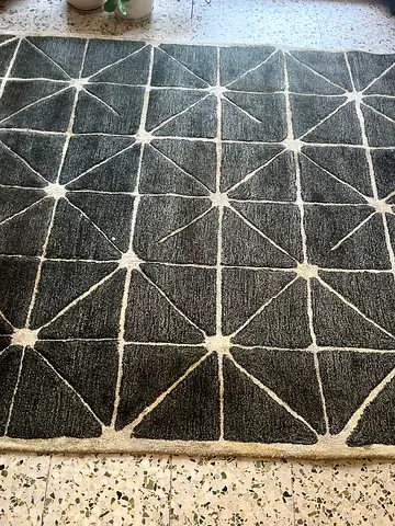 Dark grey geometric patterned area rug - good condition from home centre
