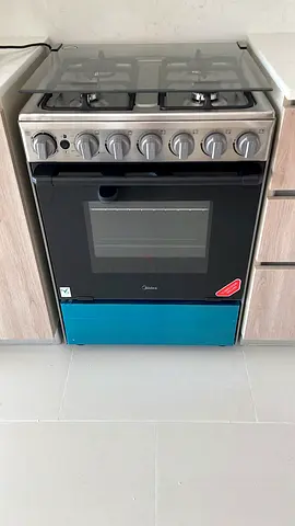 Midea 4-Burner Gas Cooker with Oven - Stainless Steel, Good Condition