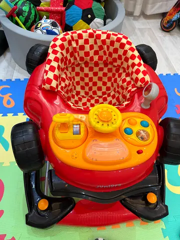 Baby car-shaped walker with interactive steering panel - good condition