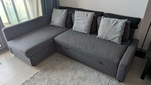 IKEA Grey L-shaped fabric sofa with storage, good condition
