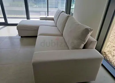 LiL-shaped fabric sofa  bed with storage chaise - modern, good condition