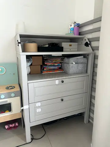 Chest of drawers and baby changing table