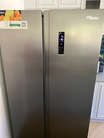 Side-by-side refrigerator freezer — internal freezer compartment, working condition