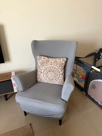 Grey upholstered accent armchair with cushion - good condition