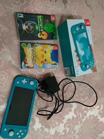 Nintendo switch lite + 2 games