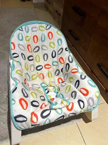 Used baby bouncer/seat with toy bar - good condition