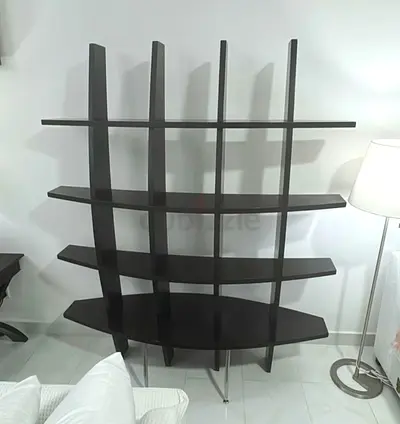 Dark wood multi-tier open shelving unit - modern display bookcase