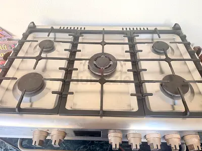 Used stainless steel gas range with oven (made in Turkey) - good condition