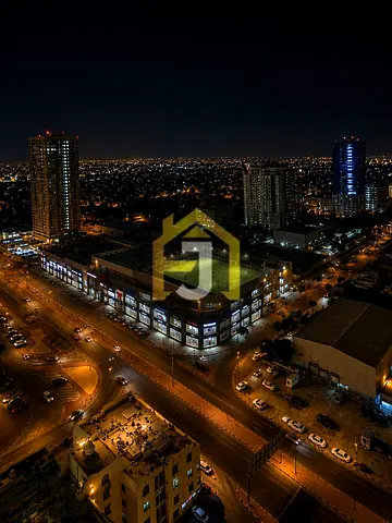 Furnished one-bedroom apartment with a living room available for annual rent; features a completely