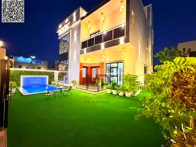 Luxury villa for sale in Al Umrah area - Ajman | 2 floors and roof terrace, 6 master bedrooms with