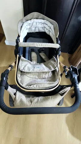 Light brown reversible baby stroller/pram with bassinet - good condition + Car Seat