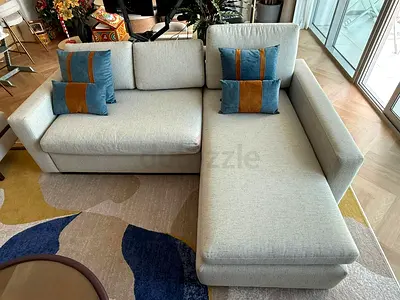 Light grey L-shaped fabric sofa with chaise (good condition)