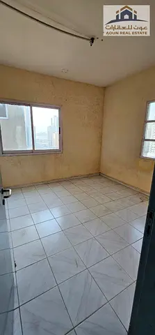 Great deal for rent in Al Nahda: 2 bedrooms and a living room with a partial sea view—only 40,000 p