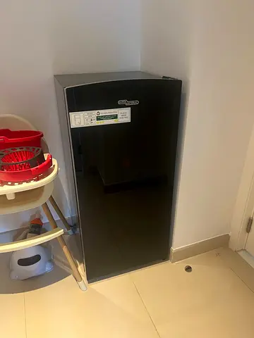 Compact single-door black mini fridge - mint condition