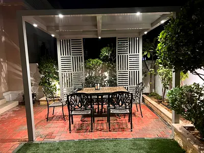Outdoor Pergola with seating and Lighting
