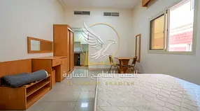 Semi furnished studio apartment for annual rent in Al Butinah Sharjah Large living room central air 